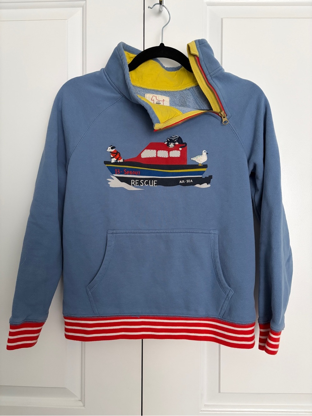 Boden Blue Pullover with Red Rescue Boat Applique and Yellow Lining